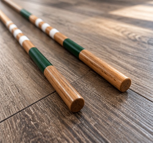 Rounded natural wood ends of the alignment sticks